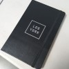 Of course we can print non-apparel items. A moleskin notebook printed for Los York.